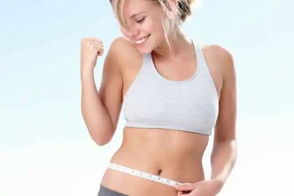 woman happy after fat reduction treatment Colchester