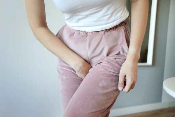 woman struggling with urine incontinence Colchester